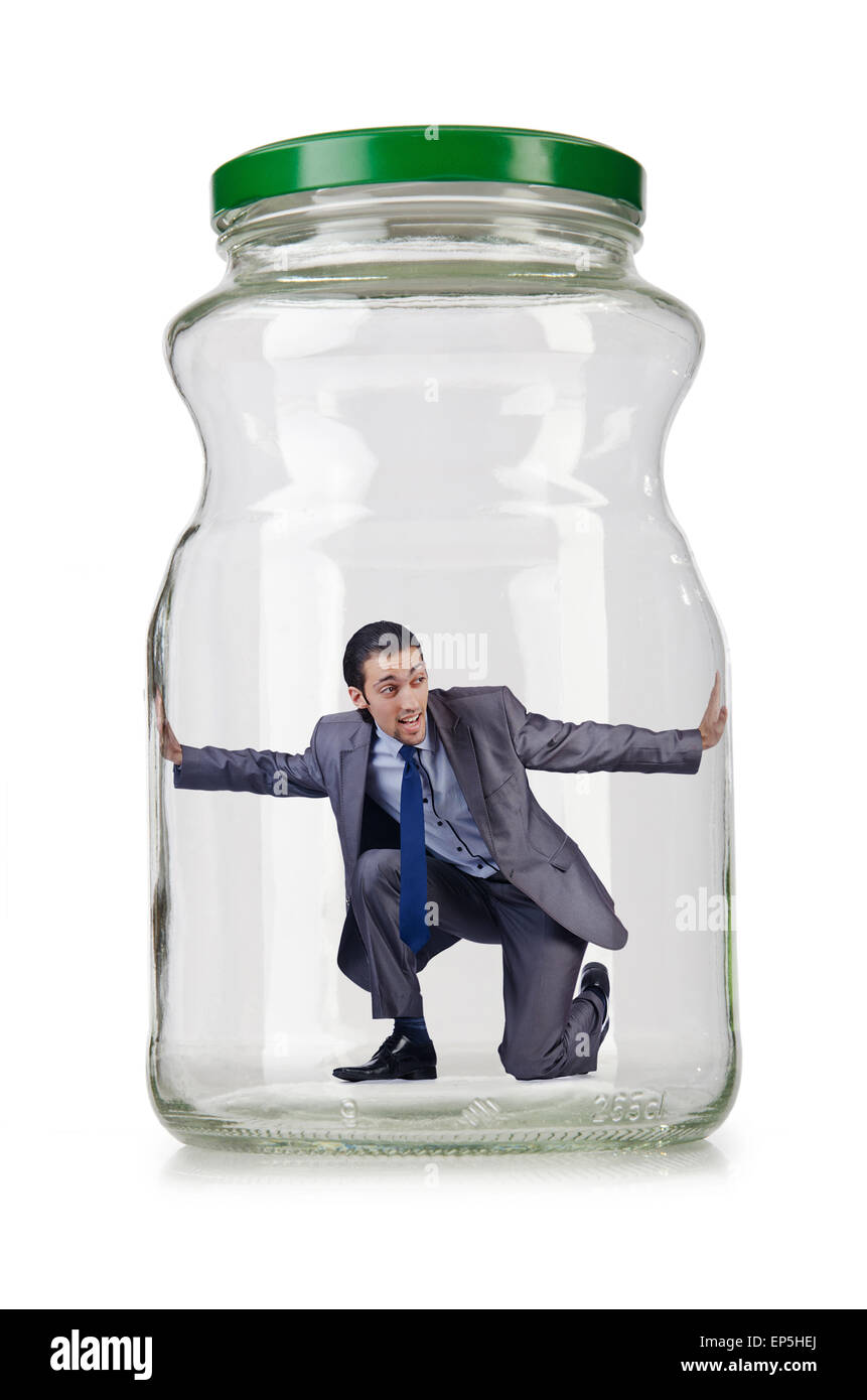 Young businessman in glass jar Stock Photo