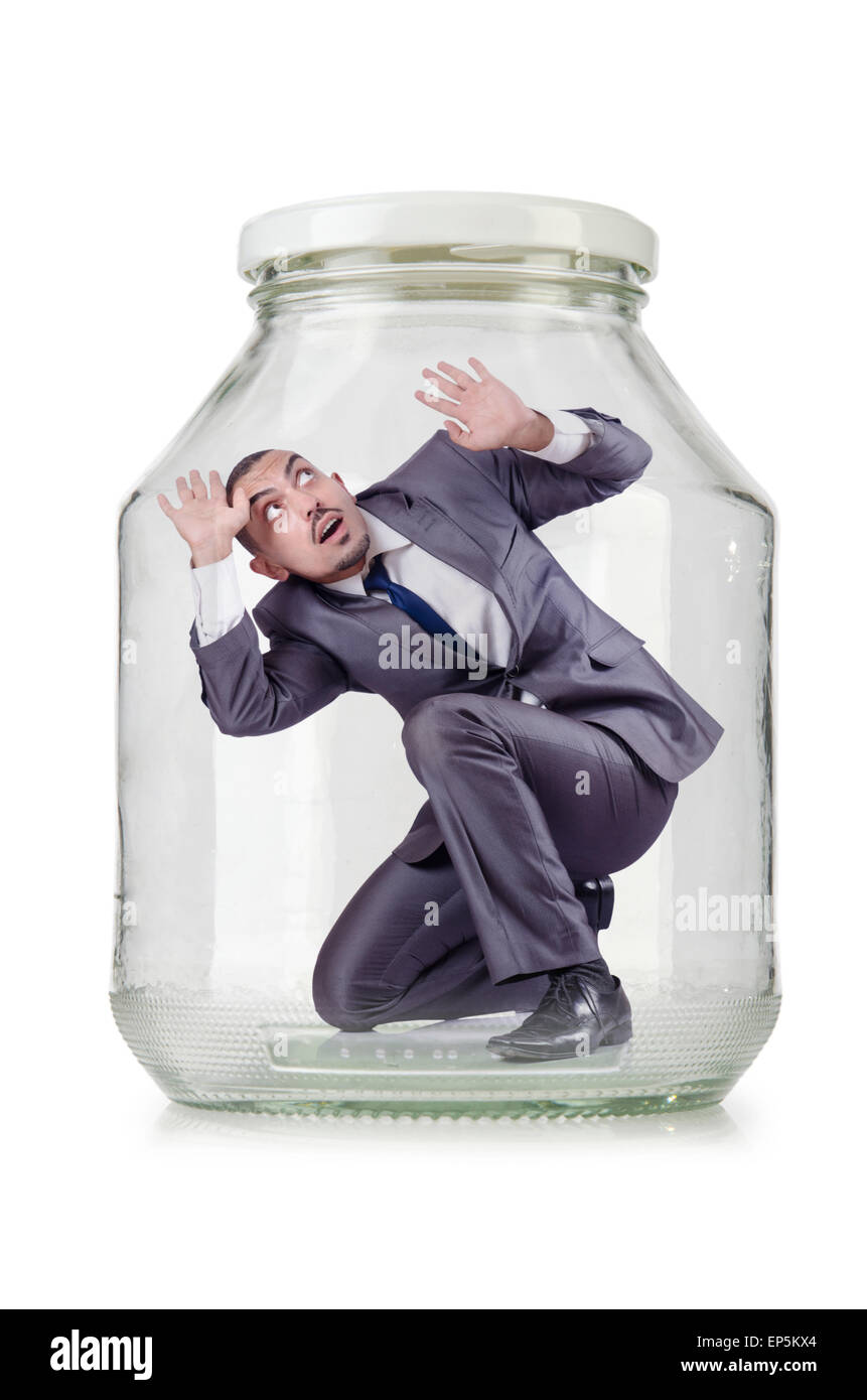 Young businessman in glass jar Stock Photo
