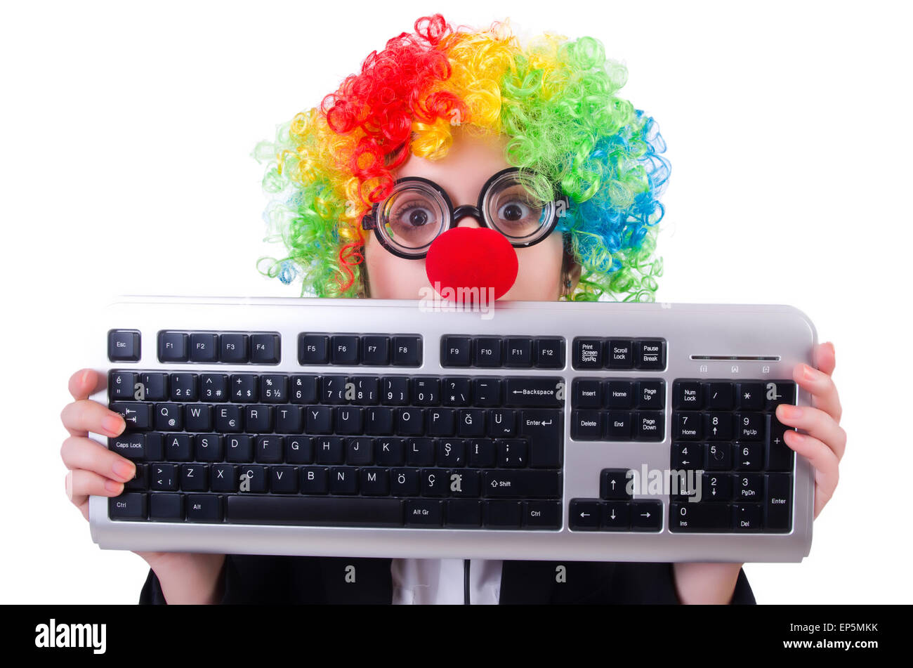 Funny clown with keyboard on white Stock Photo Alamy