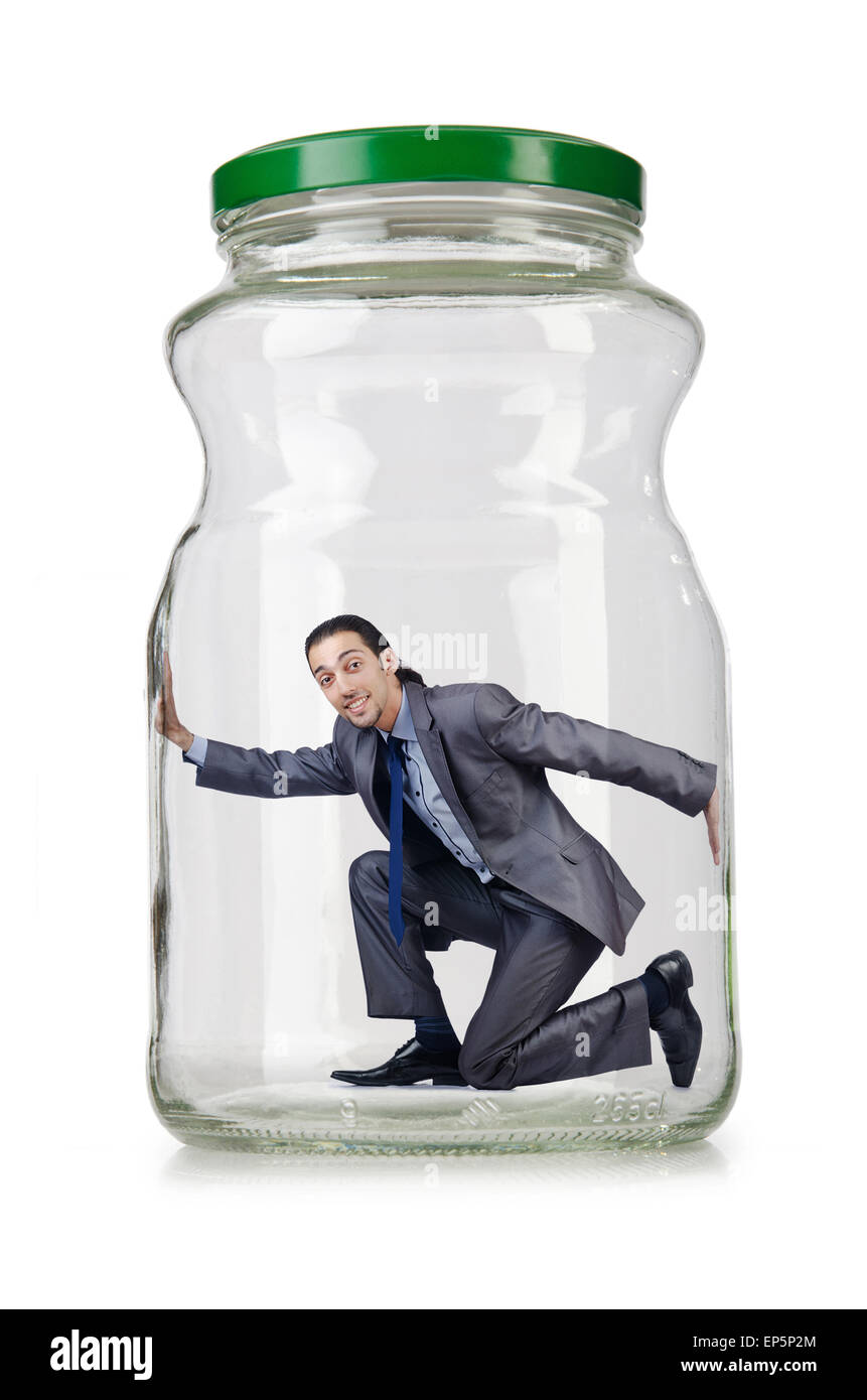 Young businessman in glass jar Stock Photo