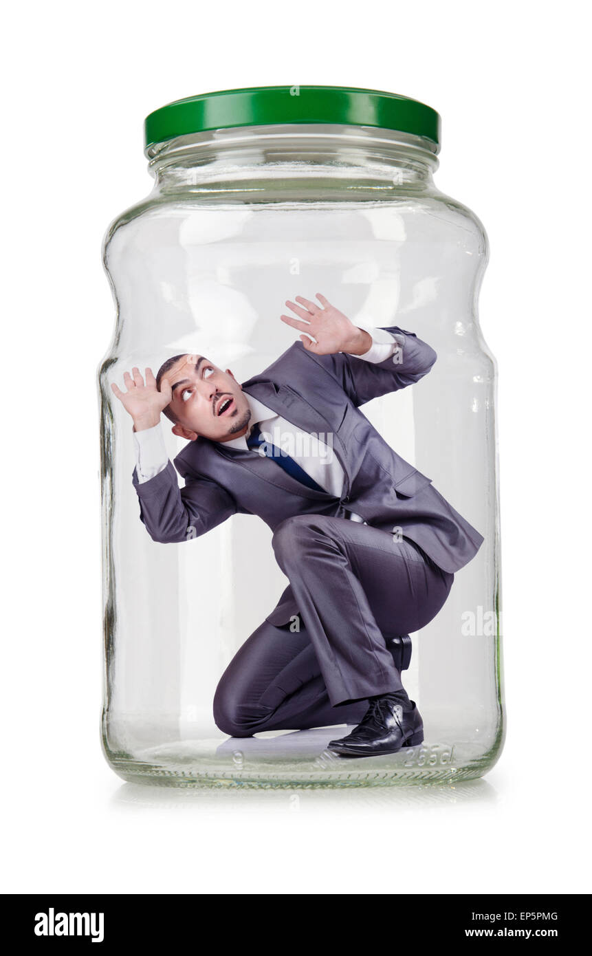 Young businessman in glass jar Stock Photo