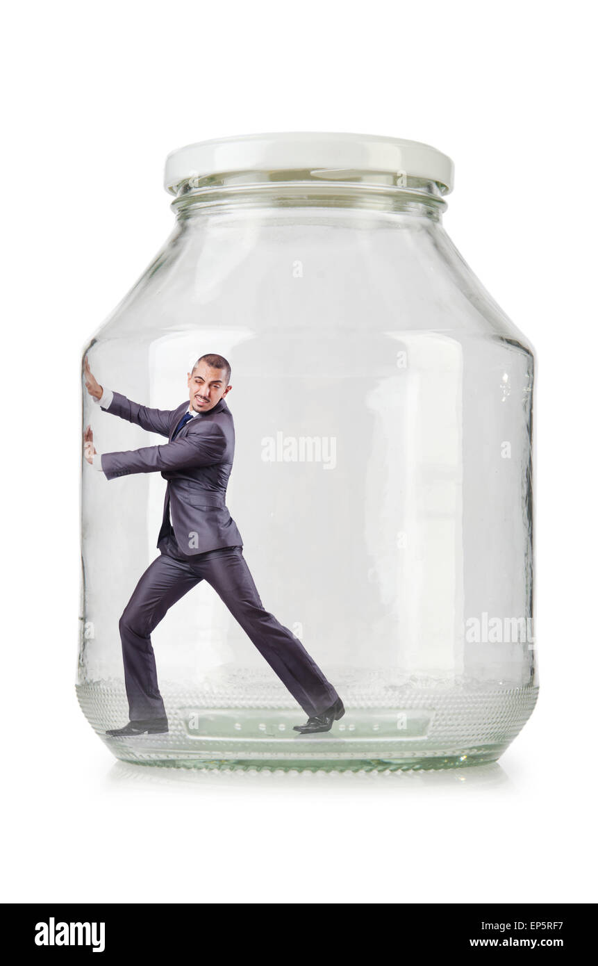 Young businessman in glass jar Stock Photo