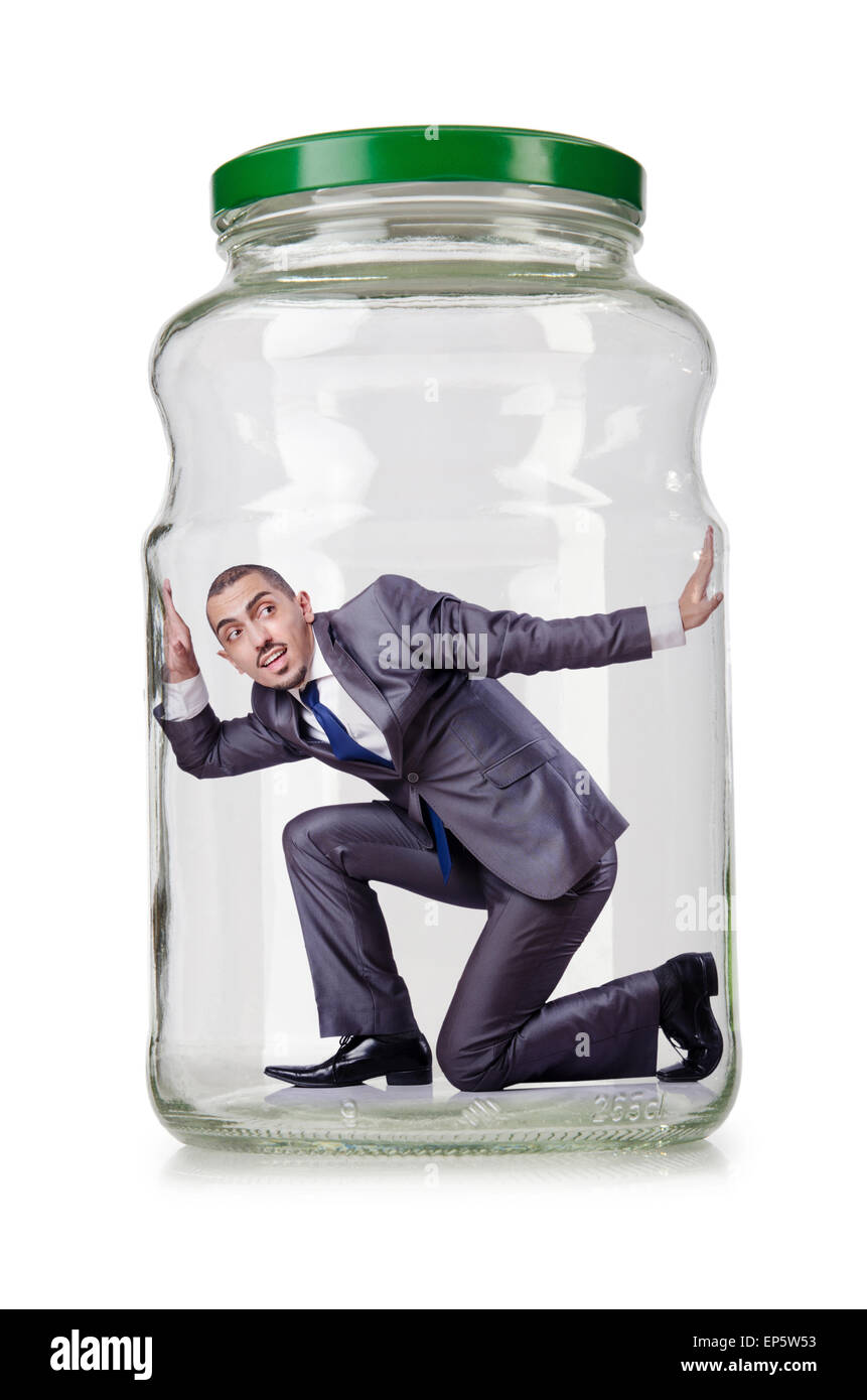 Young businessman in glass jar Stock Photo