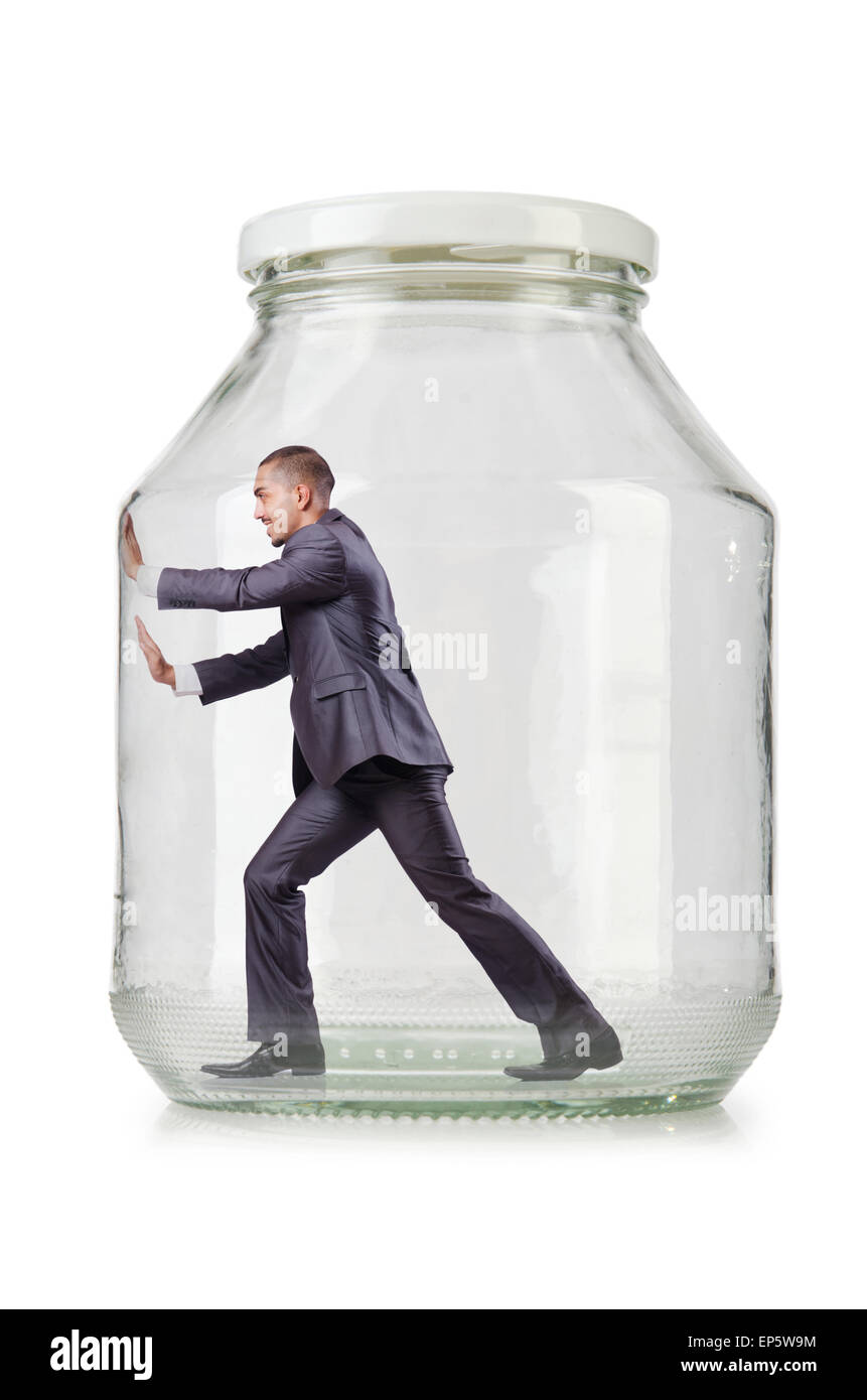 Young businessman in glass jar Stock Photo