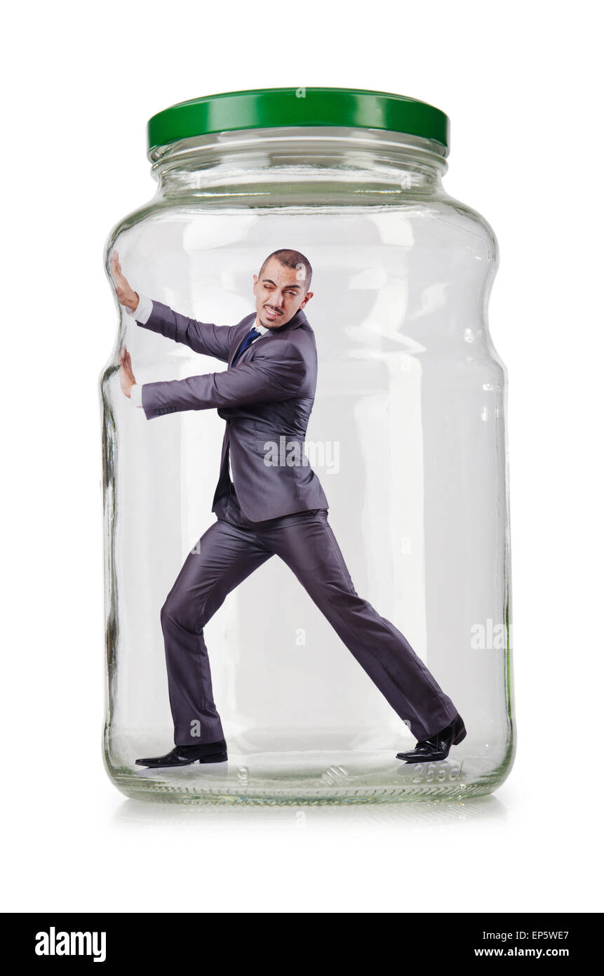 Young businessman in glass jar Stock Photo