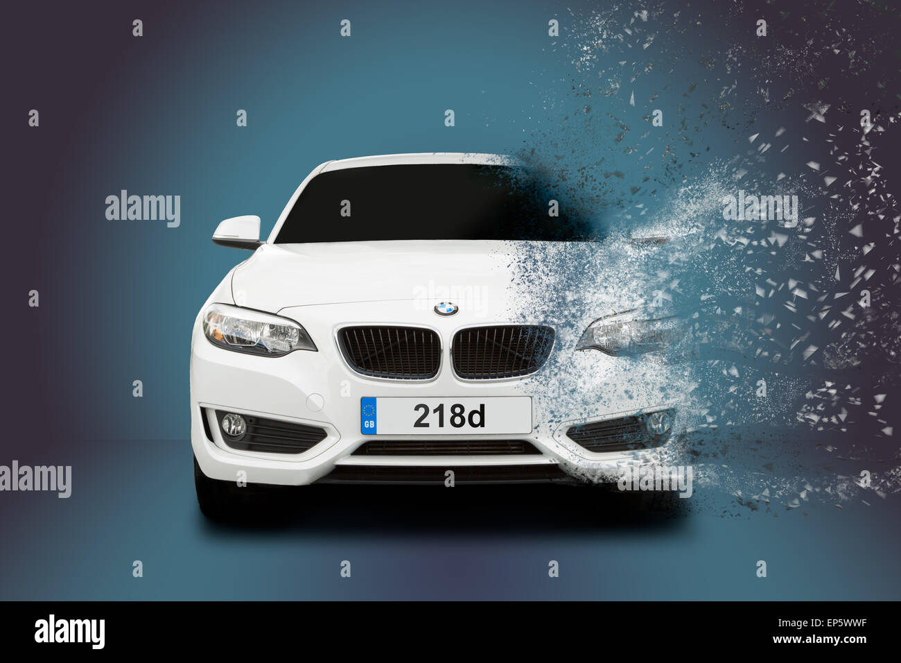 BMW 218d in a studio against a blue to black background disintegrating as if awaking from a dream and your dream disappears. Stock Photo