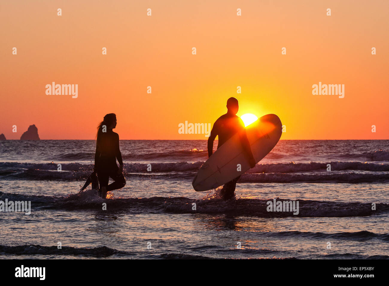 Surfers In The Water At Perran Sands Beach At Perranporth A Popular surfers-in-the-water-at-perran-sands-beach-at-perranporth-a-popular
