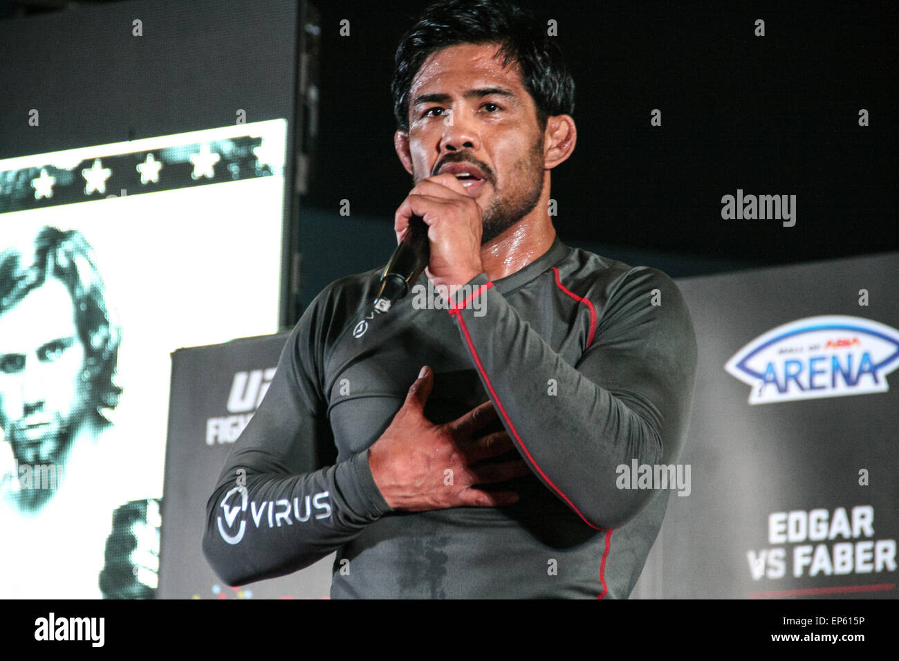 Pasay, Philippines. 13th May, 2015. Mark Munoz tells the crowd during the UFC Manila fight night open workout at the Mall of Asia Music Hall in Pasay City, that he is coming back to the Philippines to open an MMA gym specializing in wrestling. For the first time in the Philippines, the Ultimate Fighting Championship is holding its fight night on May 16, 2015 at the Mall of Asia Arena with the main title bout for the featherweight belt between Frankie Edgar and Urijah Faber. Credit:  J Gerard Seguia/Pacific Press/Alamy Live News Stock Photo