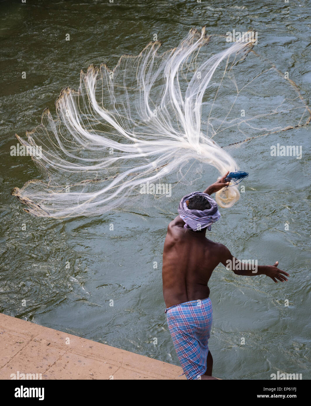 Men casting fishing nets hi-res stock photography and images - Alamy