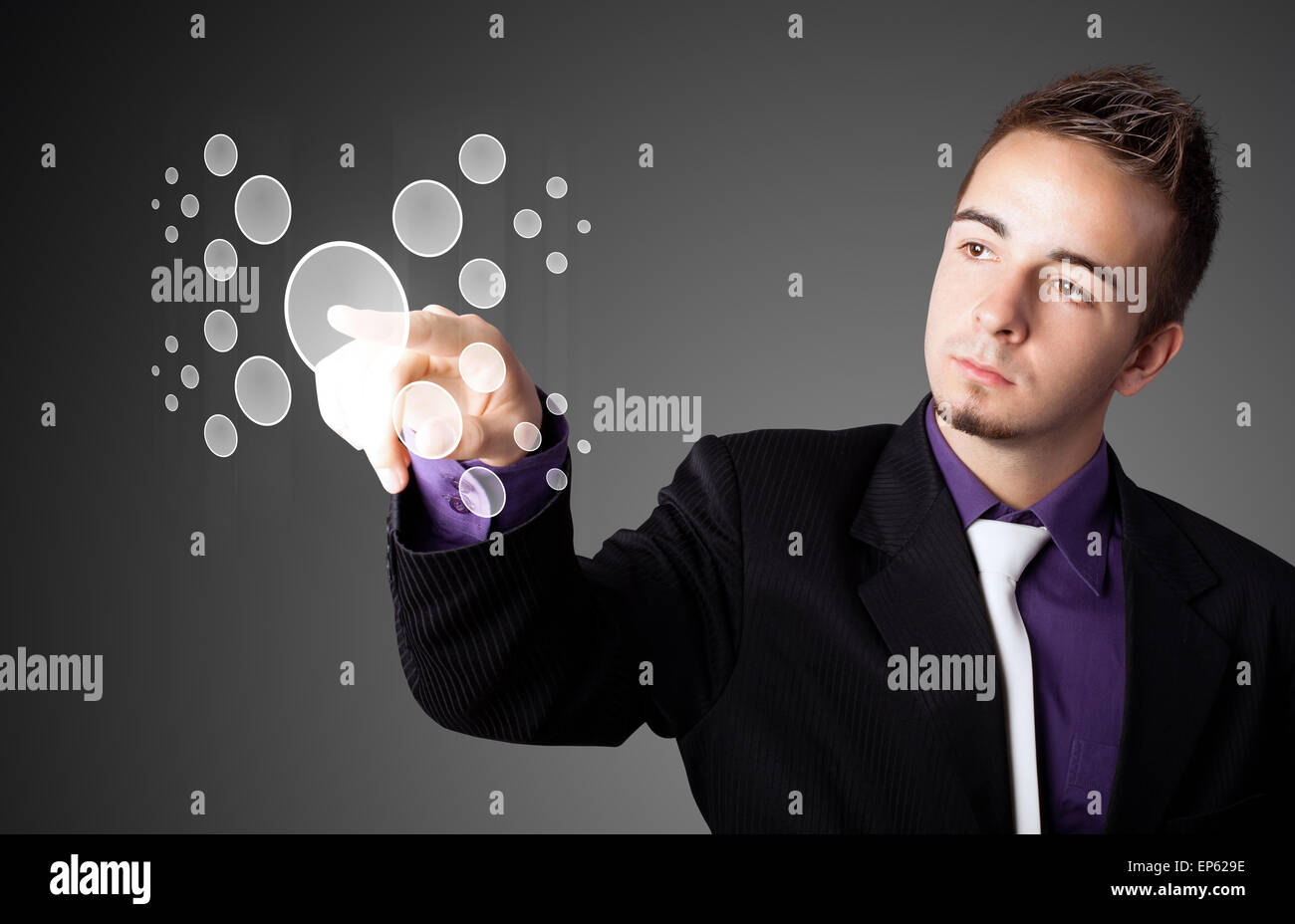 Businessman pressing high tech type of modern buttons Stock Photo - Alamy