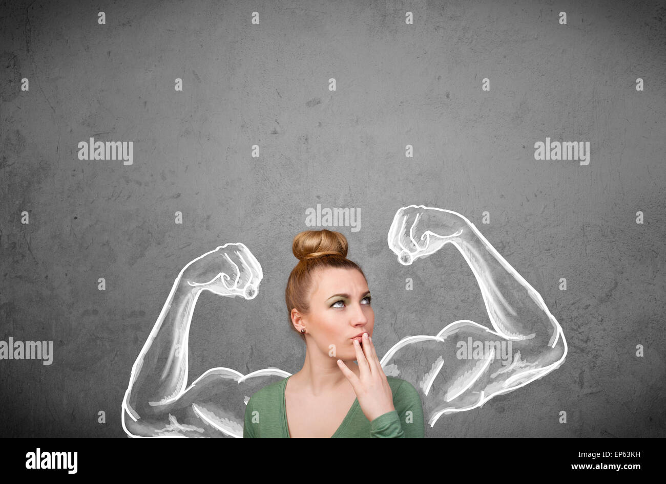Young woman with strong muscled arms Stock Photo - Alamy