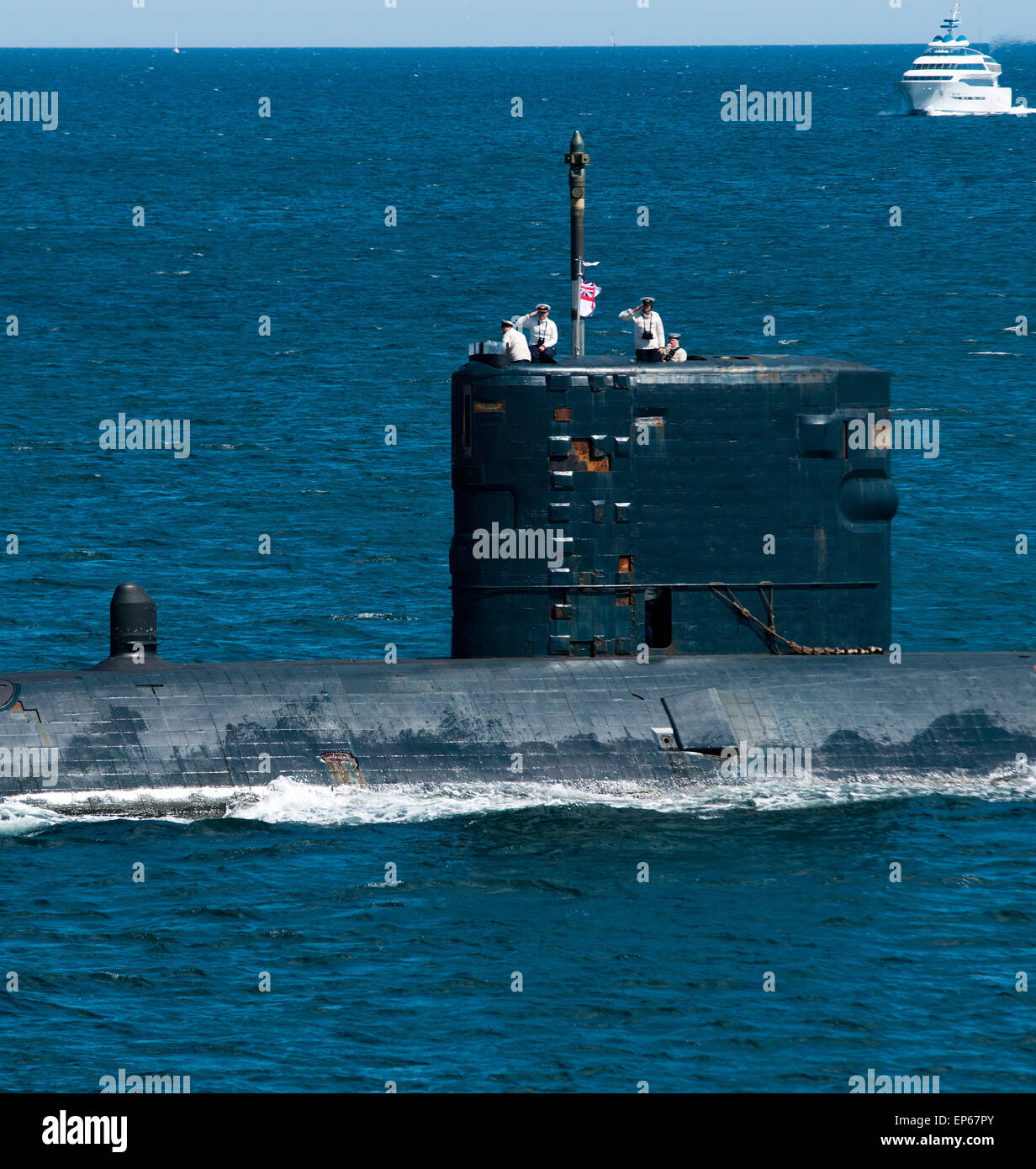 The hunter killer nuclear submarine HMS Turbulent giving marks of respect Stock Photo