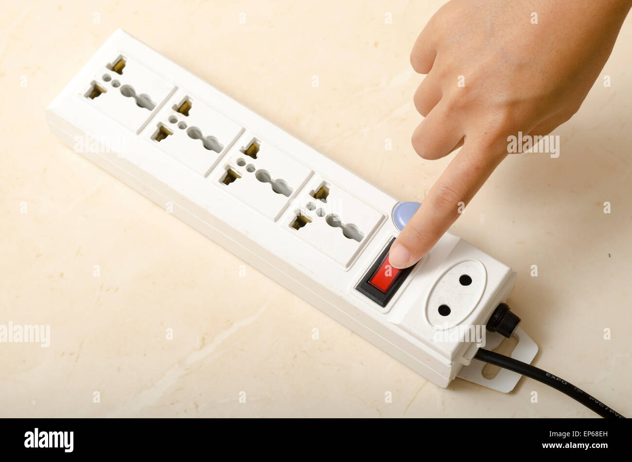 asia woman hand turn on switch multiple socket plug electric Stock Photo Alamy