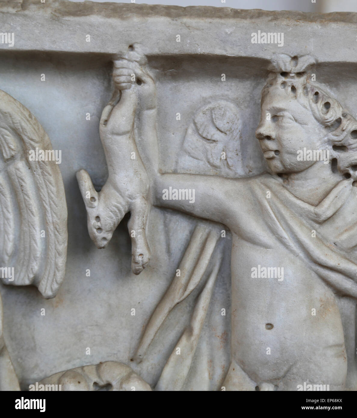 Sarcophagus. Detail. Relief. Cupid with rabbit. Ostia. National Roman Museum. Baths of Diocletian. Rome. Italy. Stock Photo