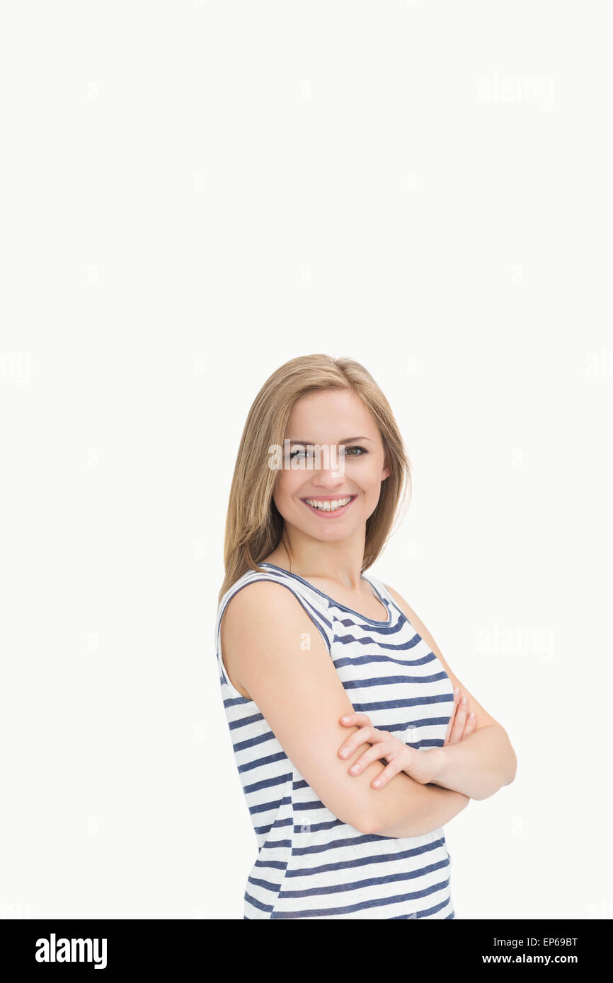 Portrait of happy confident casual woman with arms crossed Stock Photo