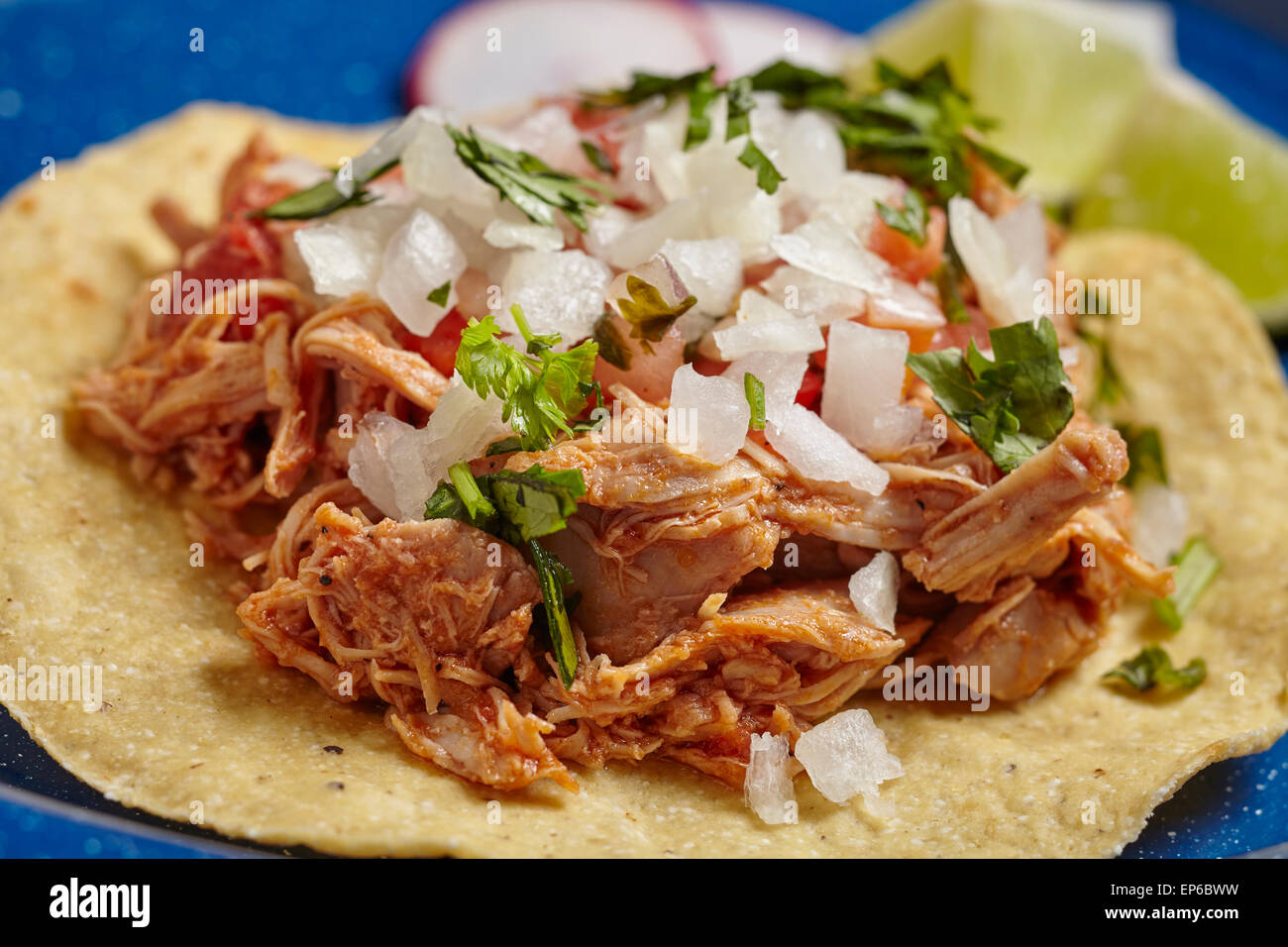 Shredded chicken tostada, a classic Mexican street food dish Stock Photo