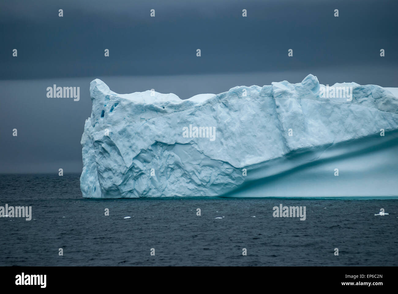Massive blue iceberg near Prince Christian Sound, southern Greenland Stock Photo