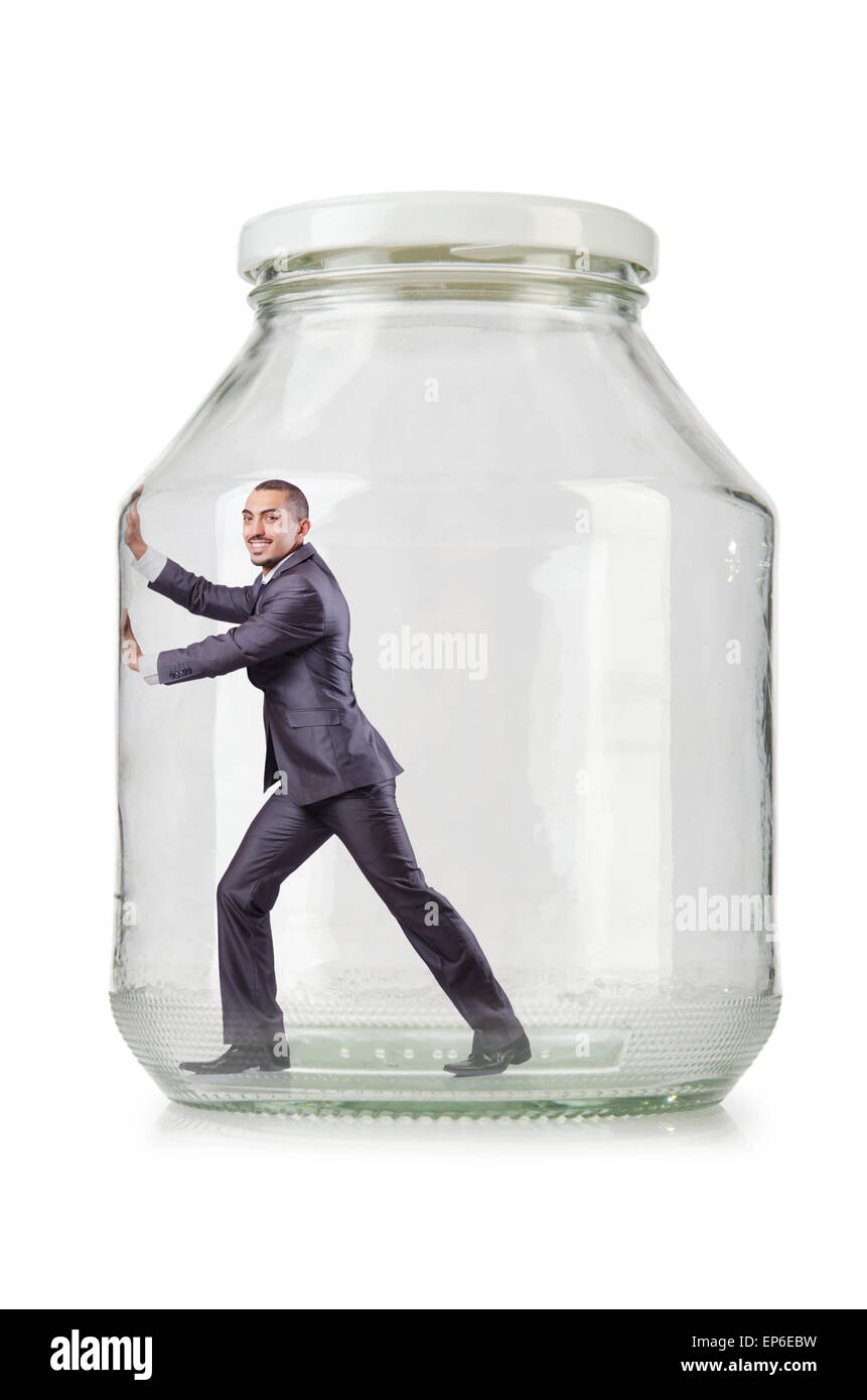 Young businessman in glass jar Stock Photo