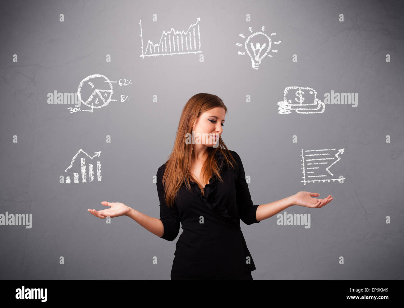 beautiful young woman juggling with statistics and graphs Stock Photo