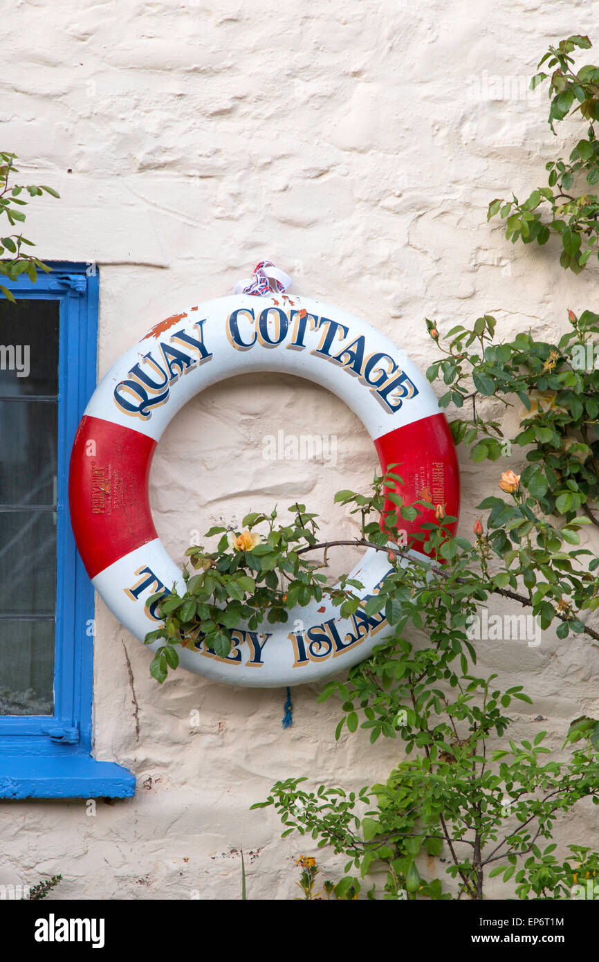 Life buoy ring on coastal cottage, England, UK Stock Photo