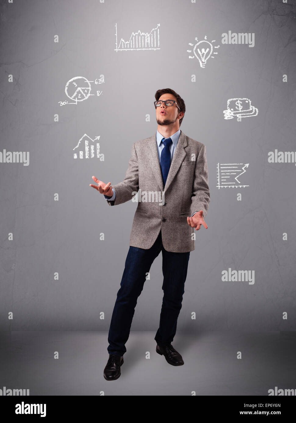 young boy juggling with statistics and graphs Stock Photo Alamy