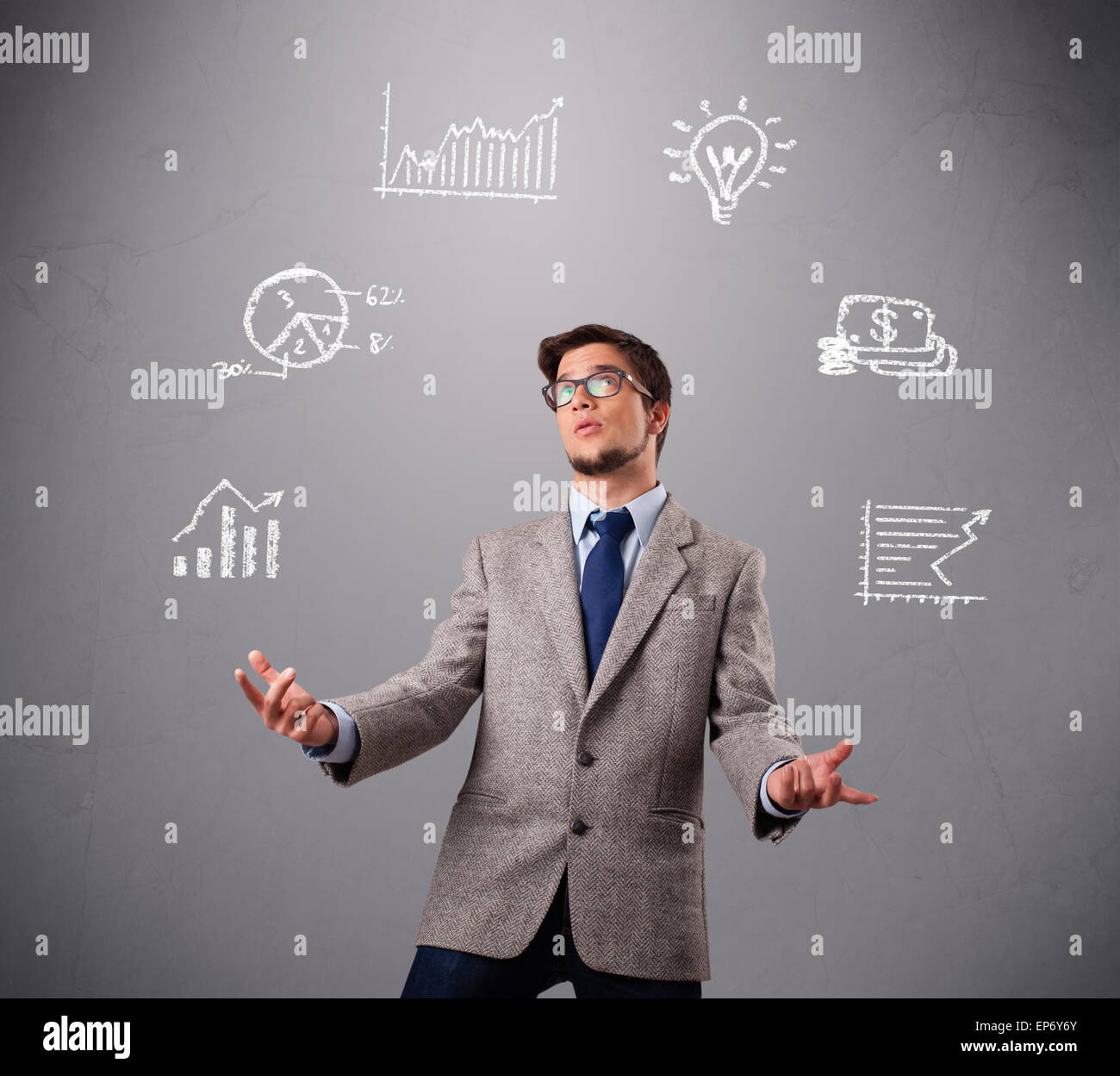 young boy juggling with statistics and graphs Stock Photo Alamy