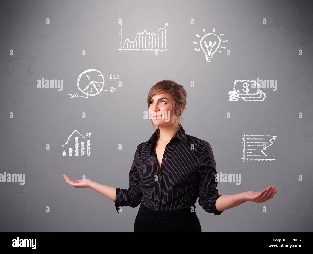 beautiful young woman juggling with statistics and graphs Stock Photo