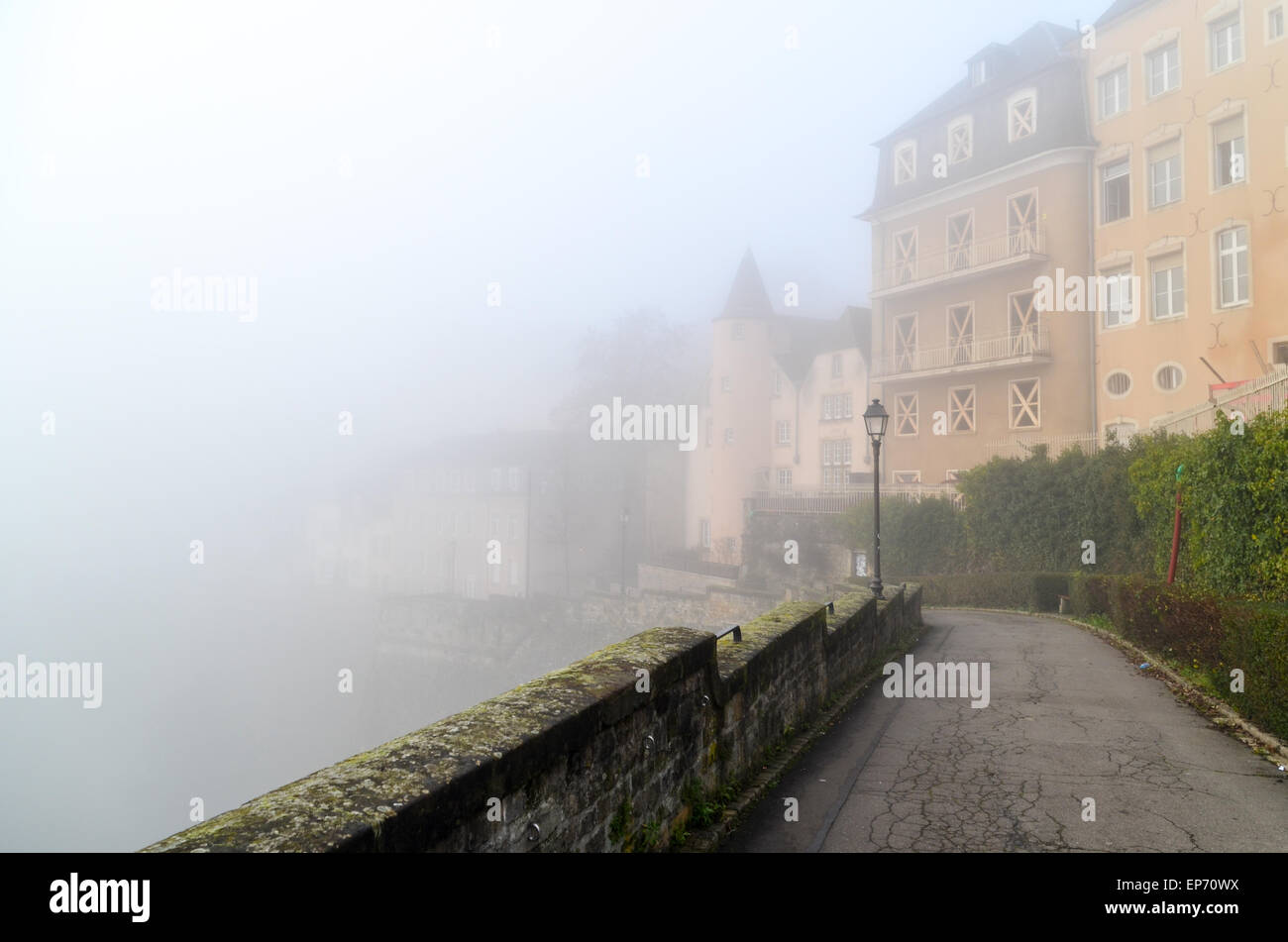 Old city centre of Luxembourg City in the foggy and misty morning Stock Photo