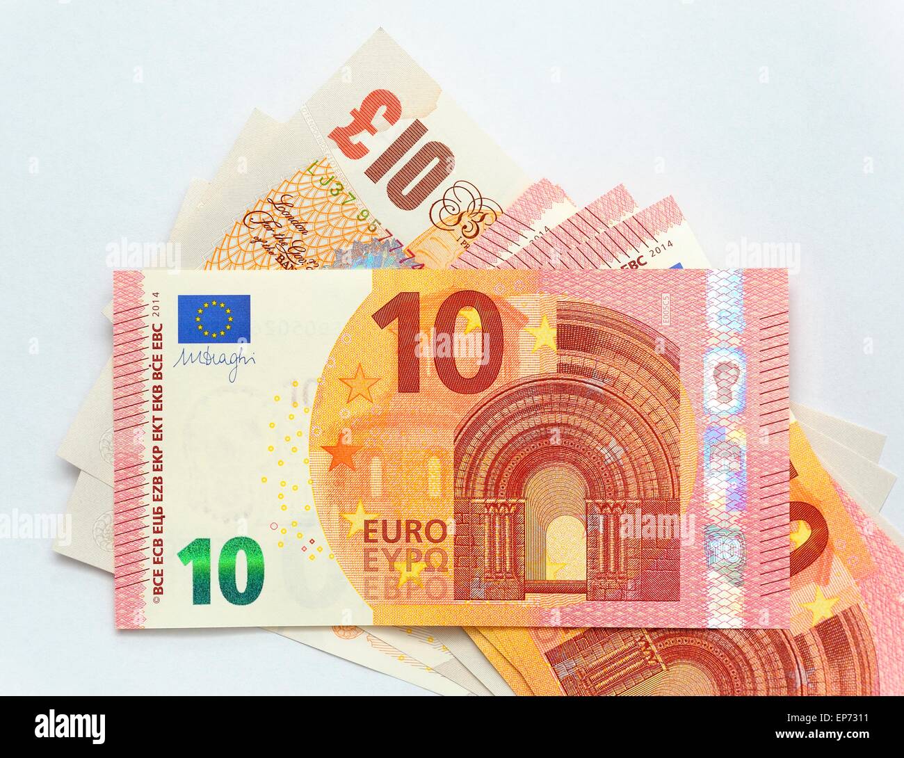 A British 10 pound note and a Euro 20 Note Stock Photo