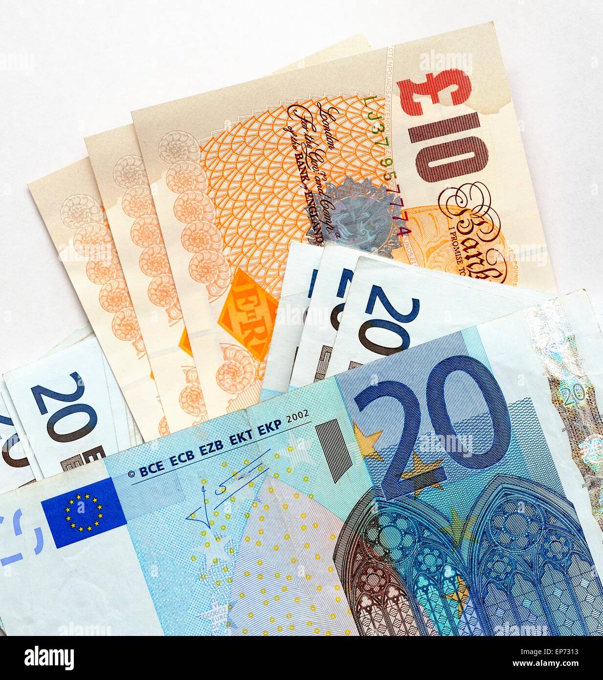 A British 10 pound note and a Euro 20 Note Stock Photo