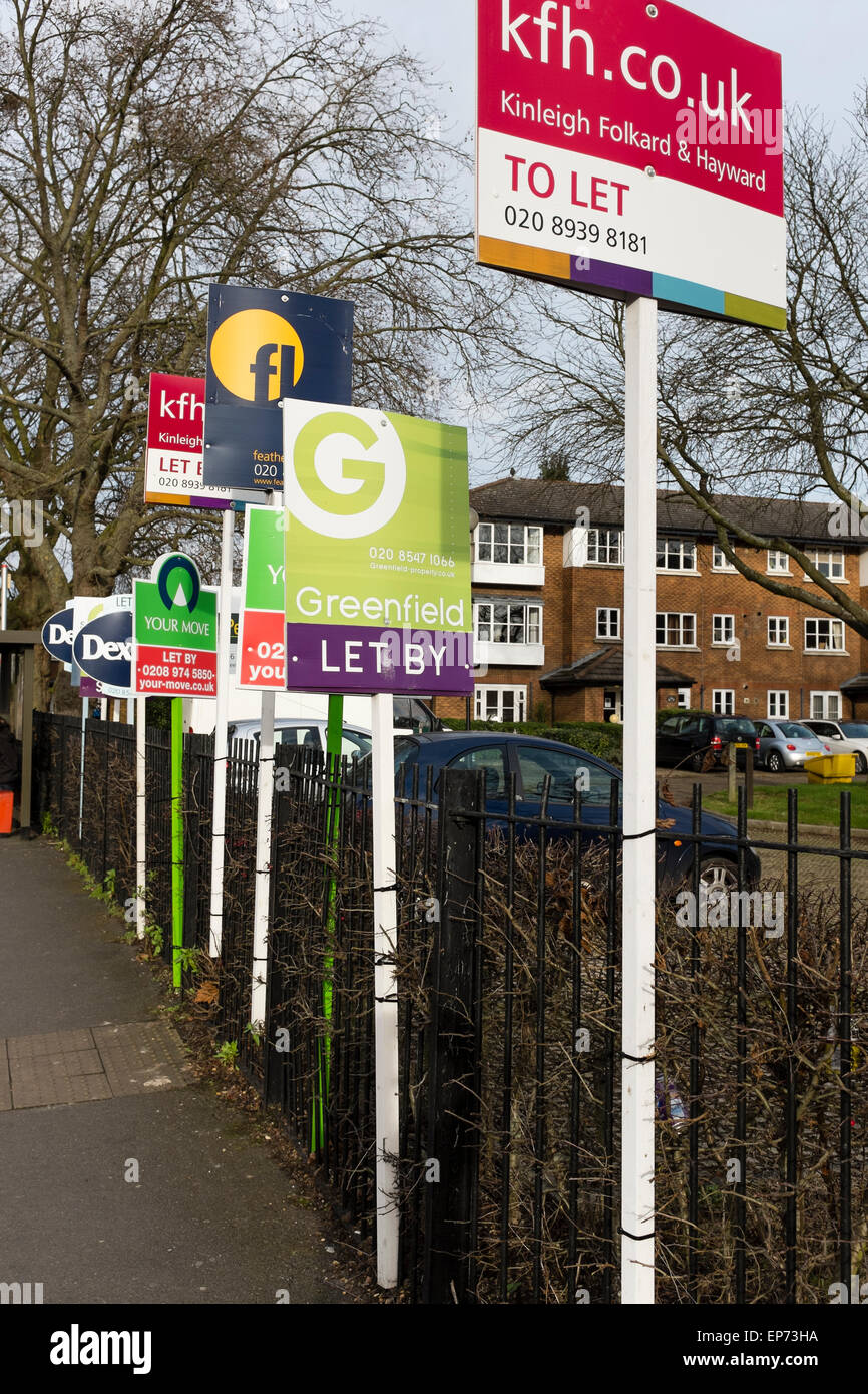 To let sign by various estate agents outside of flats in Kingston upon