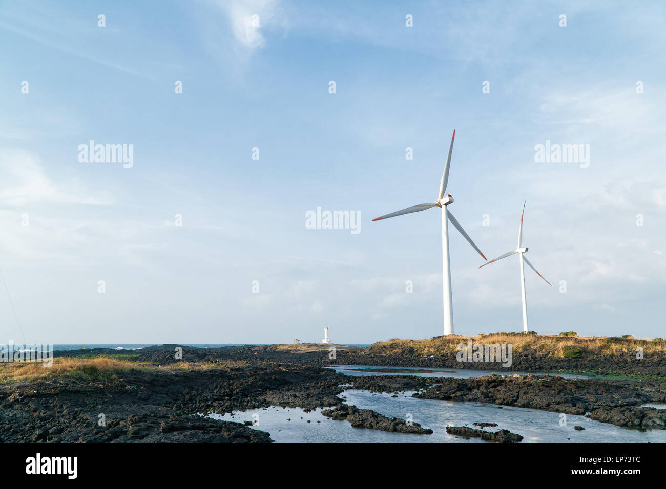 https://c8.alamy.com/comp/EP73TC/cloudy-evening-landscape-with-two-windgenerator-at-a-coast-in-jeju-EP73TC.jpg