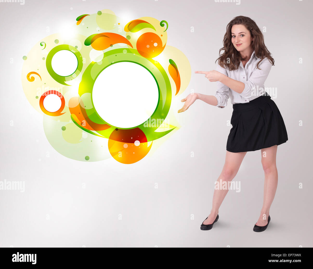 Young business woman presenting abstract copyspace Stock Photo - Alamy