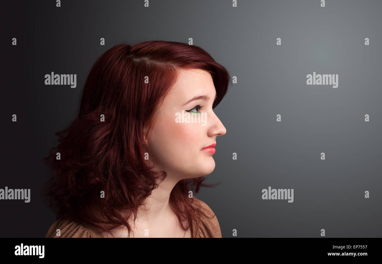 Young girl portrait thinking with copyspace Stock Photo - Alamy