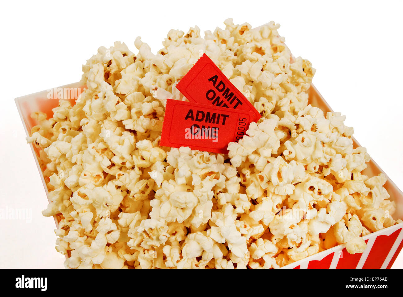 Fresh Popped Popcorn And Movie Tickets Isolated On White Background Stock Photo