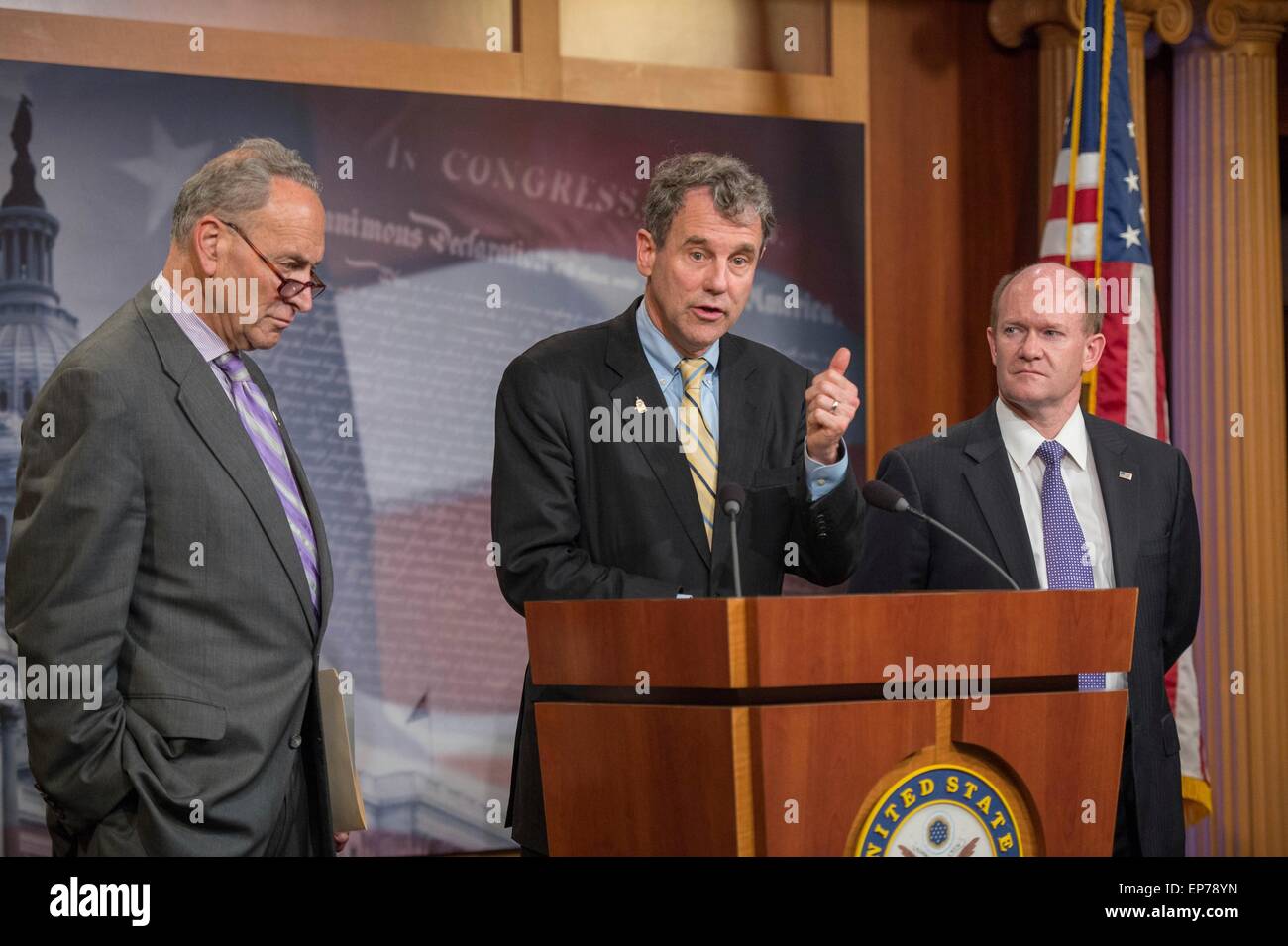 U.S. Democratic Senator Sherrod Brown comments on the trade bill legislation as Senators Chuck Schumer and Chris Coons look on during a press conference May 12, 2015 in Washington, DC. Stock Photo