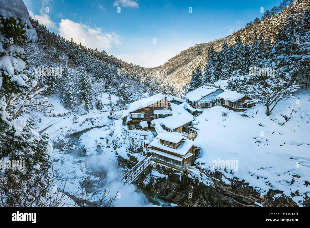 A traditional Japanese ryokan (inn) nestled in the mountains of Nagano Prefecture, Japan. Stock Photo