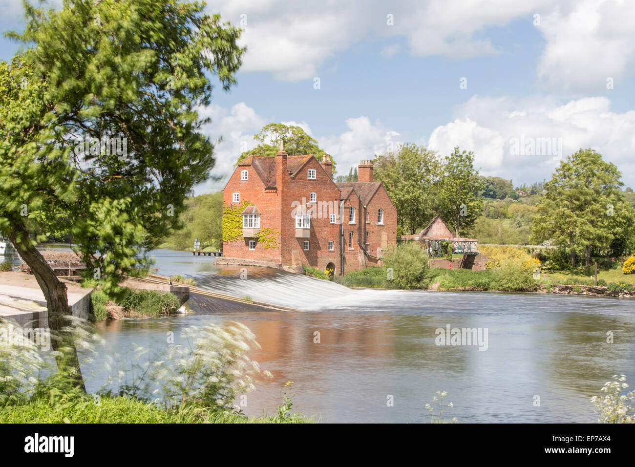 The attractively located Cropthorne Water Mill on the River Avon