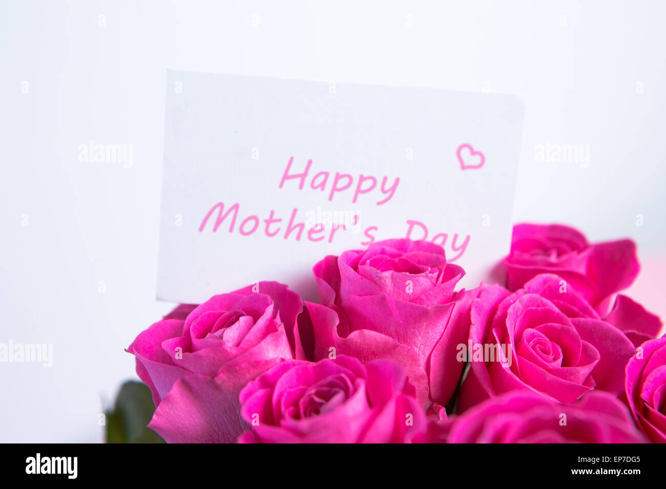 Bouquet of pink roses with happy mothers day card Stock Photo - Alamy