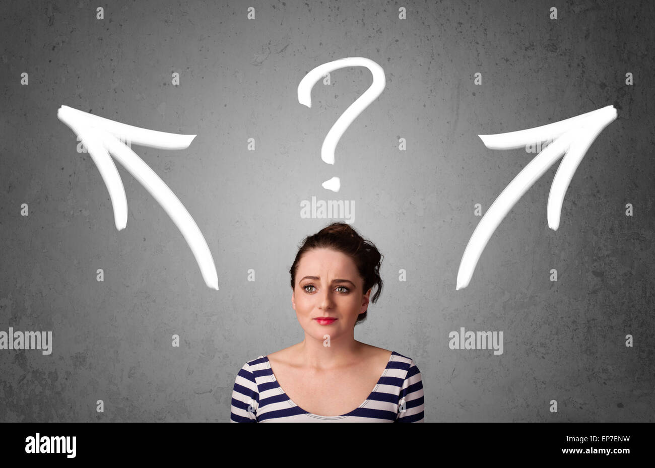 Young woman thinking arrows hi-res stock photography and images - Alamy