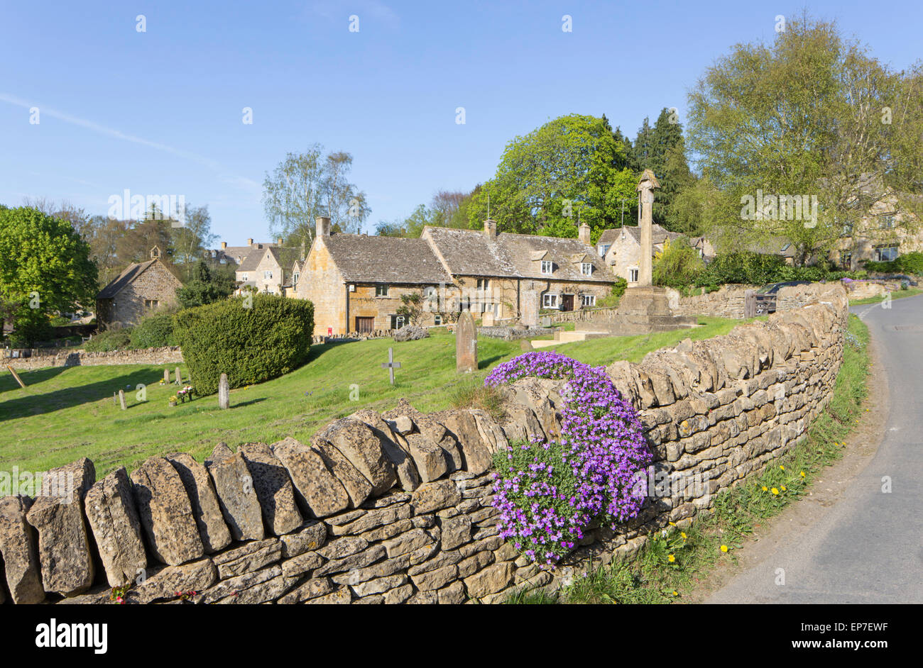 The Cotswold village of Snowshill and Church of St. Barnabas churchyard, Gloucestershire, England, UK Stock Photo