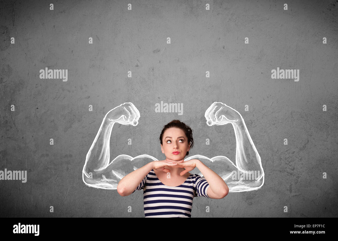 Young woman with strong muscled arms Stock Photo - Alamy