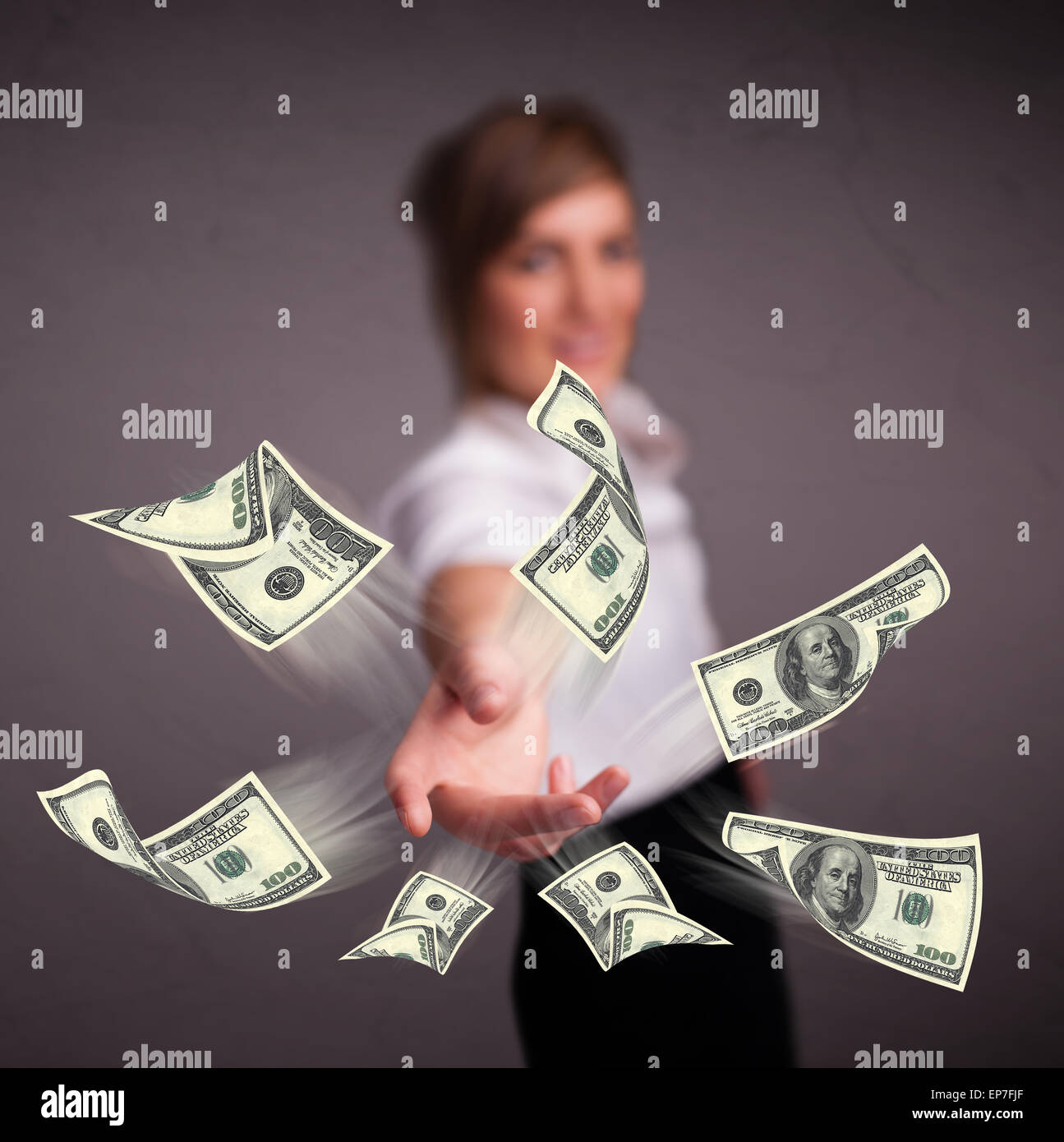 Young girl throwing money Stock Photo Alamy