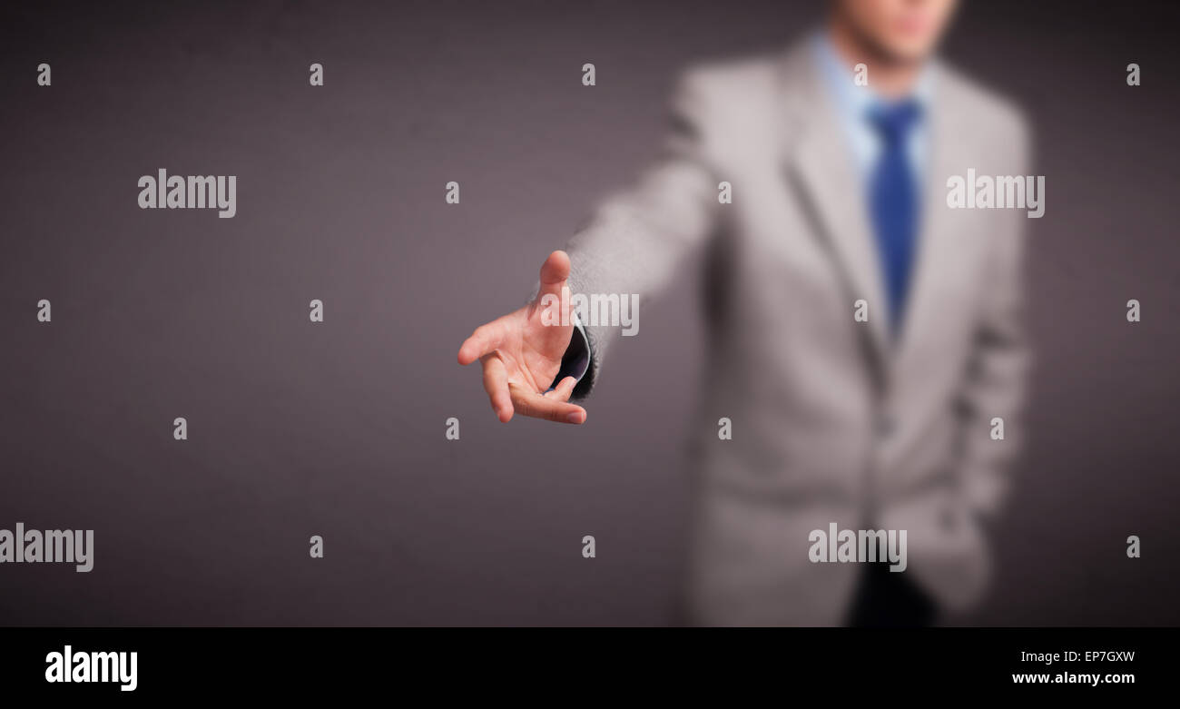 Young man standing and throwing something Stock Photo Alamy