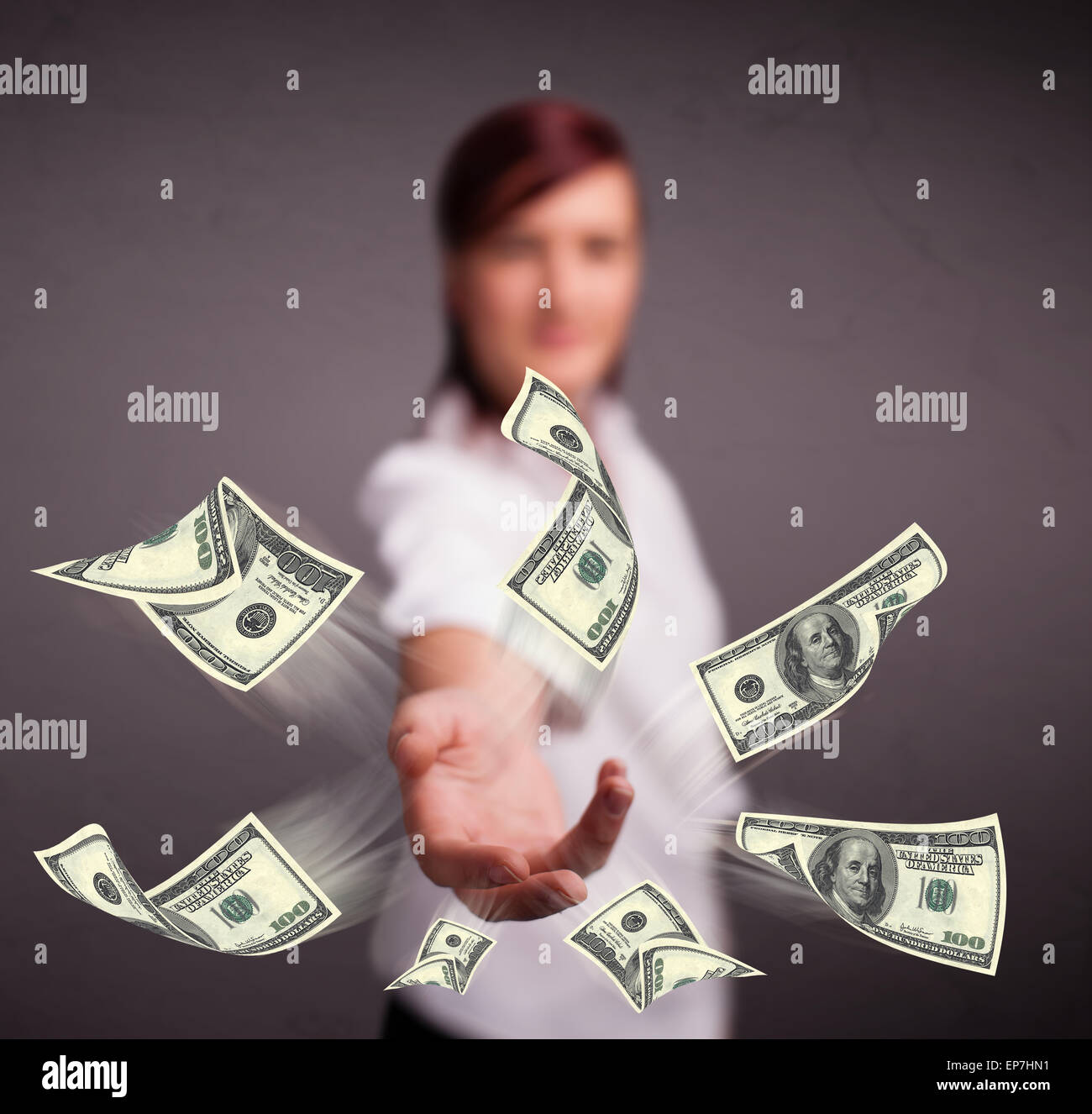 Young girl throwing money Stock Photo Alamy