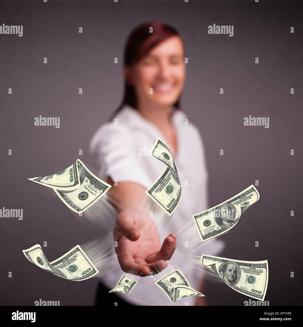 Young girl throwing money Stock Photo Alamy