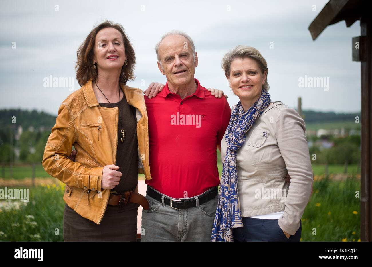 Muensingen, Germany. 14th May, 2015. Actors Irene Fischer (L-R, Anna Ziegler), Knut Hinz (Hans-Joachim Scholz), and Andrea Spatzek (Gabi Zenker) pose in Muensingen, Germany, 14 May 2015. A celebratory linden tree was planted for the 30th birthday of the well known ARD series 'Lindenstrasse.' Photo: DANIEL NAUPOLD/dpa/Alamy Live News Stock Photo