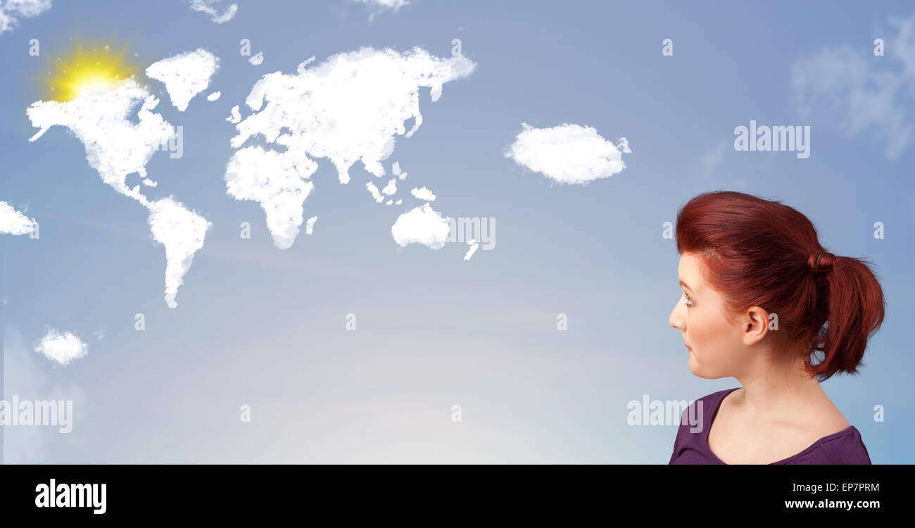 Young girl looking at world clouds and sun on blue sky Stock Photo - Alamy