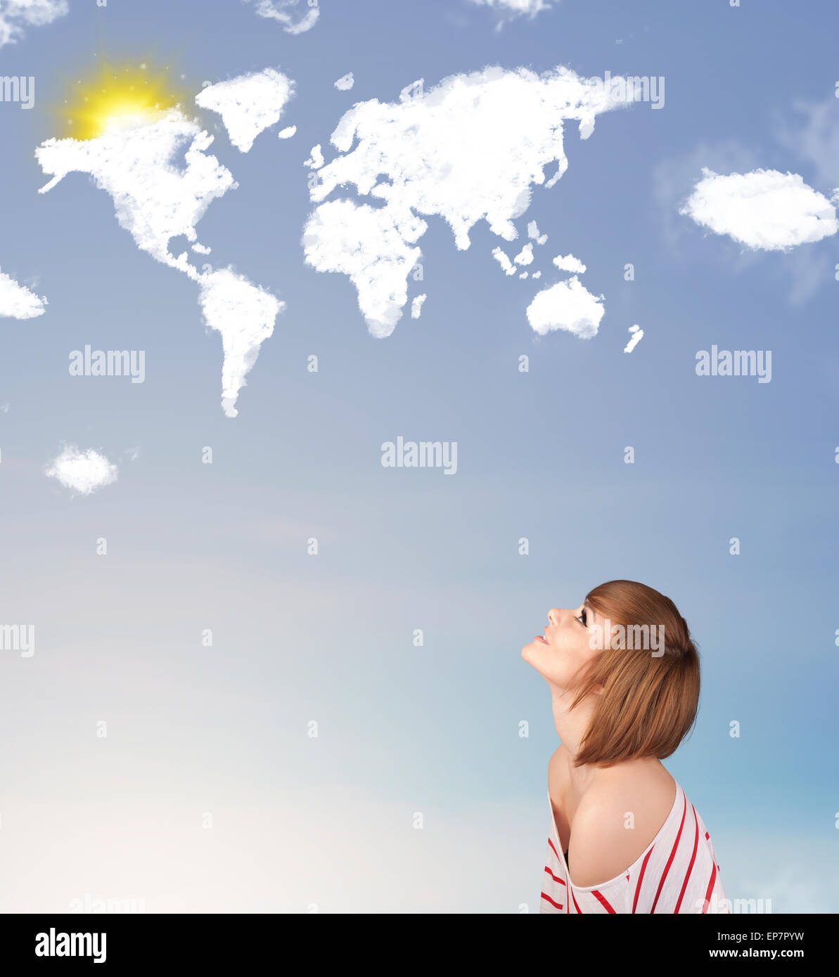 Young girl looking at world clouds and sun on blue sky Stock Photo - Alamy