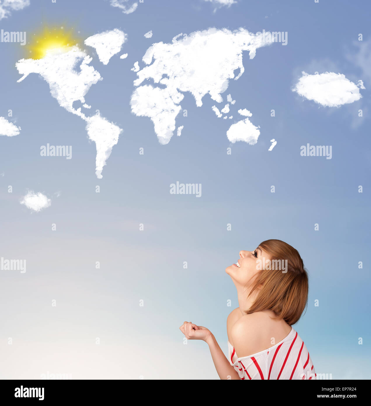 Young girl looking at world clouds and sun on blue sky Stock Photo - Alamy